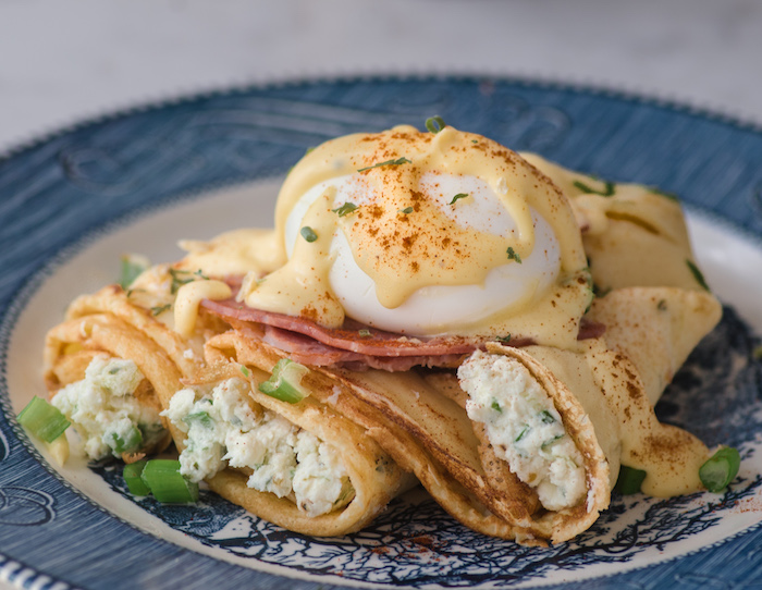 Recipe for sous vide eggs benedict with chive crepes.
